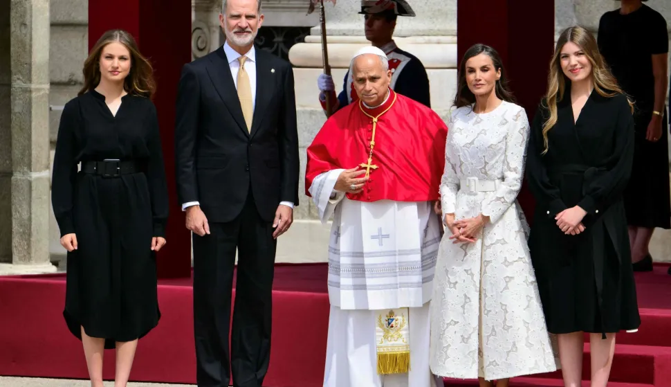 Spain's Felipe VI and Queen Letizia (2R), Princess Leonor (L) and Princess Sofia (R) welcome Pope Leo XIV (C) at the Royal Palace in Madrid on June 6, 2026. Pope Leo XIV is visiting Spain June 6-12 with stops in Madrid, Barcelona, and the Canary Islands, where he will meet with migrants and organisations dedicated to helping them. (Photo by Stefano RELLANDINI/AFP)