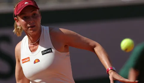Croatia's Donna Vekic eyes the ball as she plays a forehand return to Japan's Naomi Osaka during their women's singles match on day 5 of the French Open tennis tournament on Court Simonne-Mathieu at the Roland-Garros Complex in Paris on May 28, 2026. (Photo by Thomas SAMSON/AFP)
