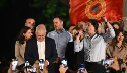 Kosovo's acting Prime Minister and leader of the Vetevendosje Movement (LVV), Albin Kurti, speaks on stage as he celebrates election results with his supporters in Pristina on June 7, 2026. (Photo by Armend NIMANI/AFP)