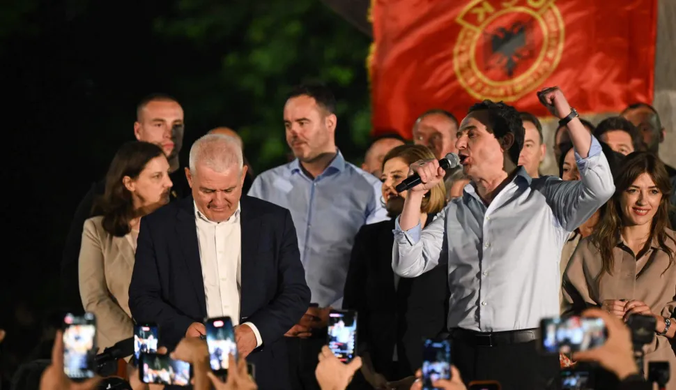 Kosovo's acting Prime Minister and leader of the Vetevendosje Movement (LVV), Albin Kurti, speaks on stage as he celebrates election results with his supporters in Pristina on June 7, 2026. (Photo by Armend NIMANI/AFP)