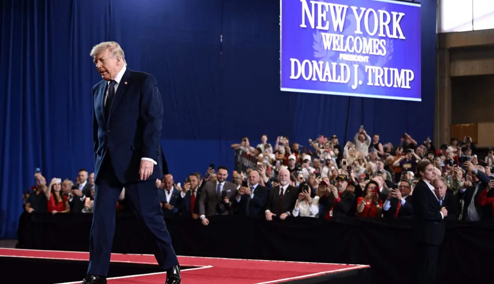 US President Donald Trump walks on the stage before speaking on the economy at Rockland Community College Fieldhouse in Suffern, New York, on May 22, 2026. Trump is the first sitting president to visit the northern New York City suburbs since Gerald Ford in 1976. (Photo by Brendan SMIALOWSKI/AFP)