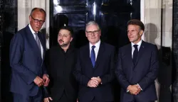 (L to R) Germany's Chancellor Friedrich Merz, Ukraine's President Volodymyr Zelensky, Britain's Prime Minister Keir Starmer and France's President Emmanuel Macron chat on the 10 Downing Street doorstep after a meeting in central London on June 7, 2026. (Photo by Henry NICHOLLS/AFP)