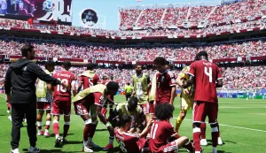 SANTA CLARA, CALIFORNIA - JUNE 13: Boualem Khoukhi #16 of Qatar celebrates with teammates after scoring the team's first goal during the FIFA World Cup 2026 Group B match between Qatar and Switzerland at San Francisco Bay Area Stadium on June 13, 2026 in Santa Clara, California. Emilee Chinn/Getty Images/AFP (Photo by Emilee Chinn/GETTY IMAGES NORTH AMERICA/Getty Images via AFP)