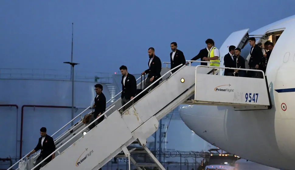 Iran's players disembark on arrival at the Tijuana International Airport in Tijuana, Mexico on June 7, 2026, ahead of the FIFA 2026 World Cup football tournament. (Photo by Guillermo Arias/AFP)