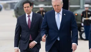 (FILES) US President Donald Trump and US Secretary of State Marco Rubio walk to board Air Force One prior to departure from Joint Base Andrews in Maryland, March 20, 2026, as they travel to Florida for the weekend. US President Donald Trump said on May 23 that Iran and the US had "largely negotiated" a deal that included opening the Strait of Hormuz, but the draft was "subject to finalization." (Photo by SAUL LOEB/AFP)