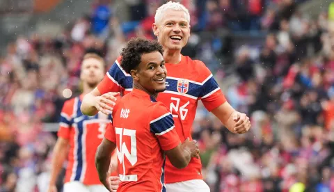Norway's midfielder #20 Antonio Nusa (C) celebrates scoring the 2-0 goal with his teammates including Norway's defender #26 Julian Ryerson during the friendly match between Norway and Sweden at Ullevaal Stadium, on June 1, 2026 ahead of the 2026 FIFA World Cup football tournament. (Photo by Lise ?serud/NTB/AFP)/Norway OUT