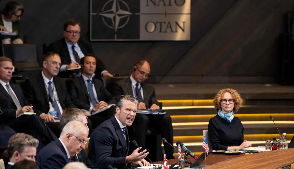 TOPSHOT - US Secretary of Defence Pete Hegseth (C) speaks during a NATO Defence Ministers meeting at the NATO headquarters, in Brussels, on June 18, 2026. (Photo by JOHN THYS/AFP)