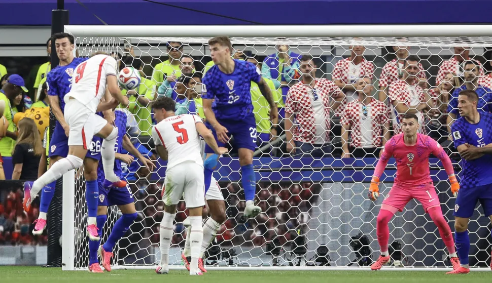 Dallas, 17.06.2026 - Utakmica 1. kola L skupine Svjetskoga nogometnoga prvenstva Engleska - Hrvatska. Na slici Petar Musa, Luka Vu&scaron;ković, Dominik Livaković, Harry Kane, John Stones.foto HINA/ Daniel KASAP/ ds