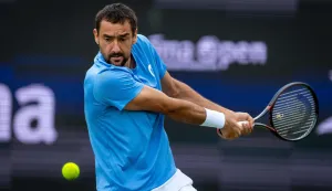 Croatia's Marin Cilic plays a backhand return to Russia's Daniil Medvedev during their mens singles match at the Libema Open tennis tournament in Rosmalen, on June 12, 2026. (Photo by Iris van den Broek/ANP/AFP)/Netherlands OUT