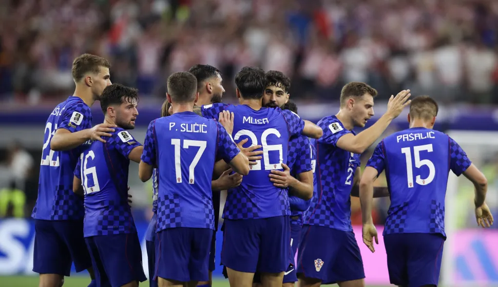 Dallas, 17.06.2026 - Utakmica 1. kola L skupine Svjetskoga nogometnoga prvenstva Engleska - Hrvatska. Na slici hrvatski nogometa&scaron;i slave zgoditak koji je postigao Petar Musa.foto HINA/ Daniel KASAP/ ds