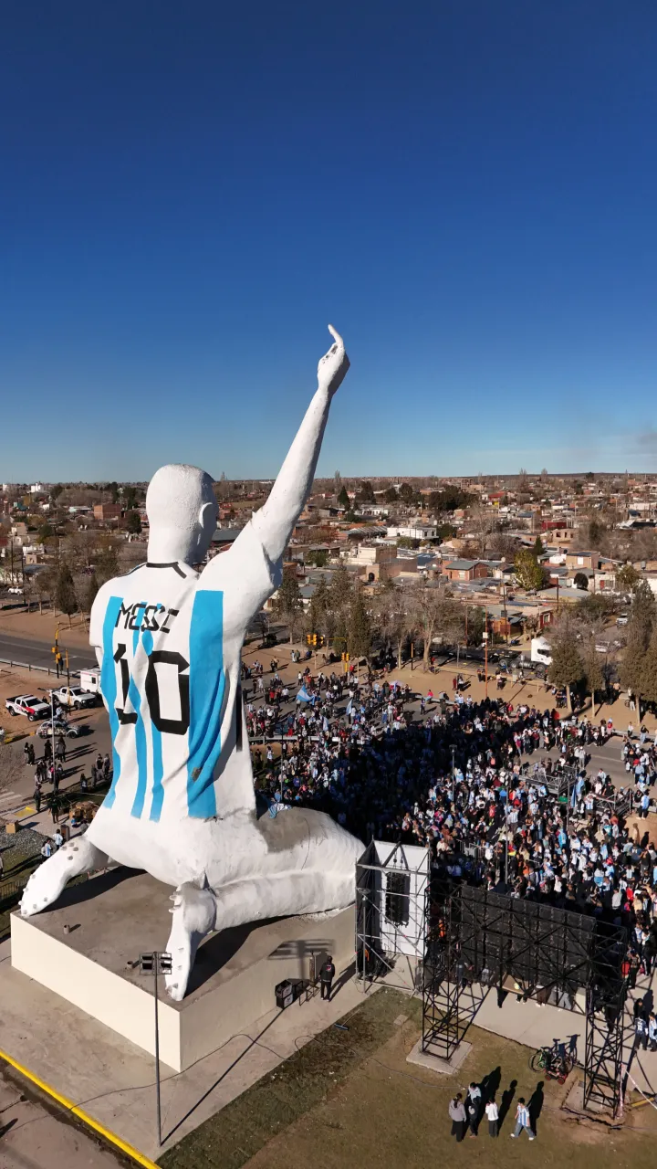 People are gathered near a statue of Lionel Messi in Neuquen Province, Argentina, June 16, 2026, in this picture obtained from social media. Carlos Martinez/via REUTERS THIS IMAGE HAS BEEN SUPPLIED BY A THIRD PARTY. MANDATORY CREDIT. NO RESALES. NO ARCHIVES. Verification: - Date and location verified by original file metadata and corroborating visuals. Photo: Carlos Martinez/REUTERS