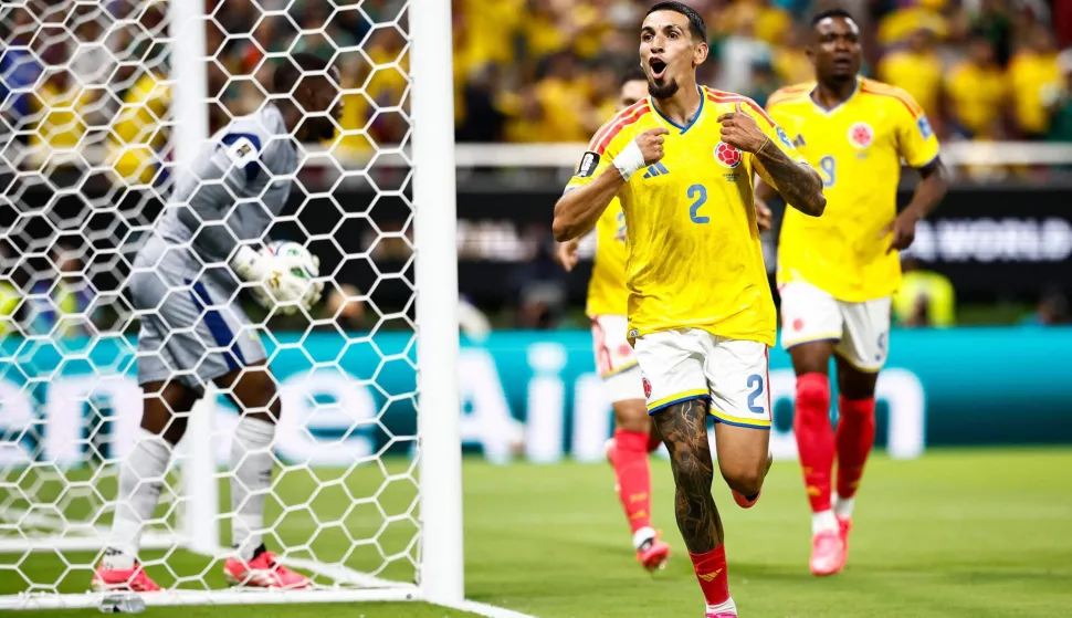 Colombia's defender #02 Daniel Munoz celebrates scoring his team's first goal during the 2026 World Cup Group K football match between Colombia and Democratic Republic of Congo at the Guadalajara Stadium in Zapopan on June 23, 2026. (Photo by Ulises RUIZ/AFP)
