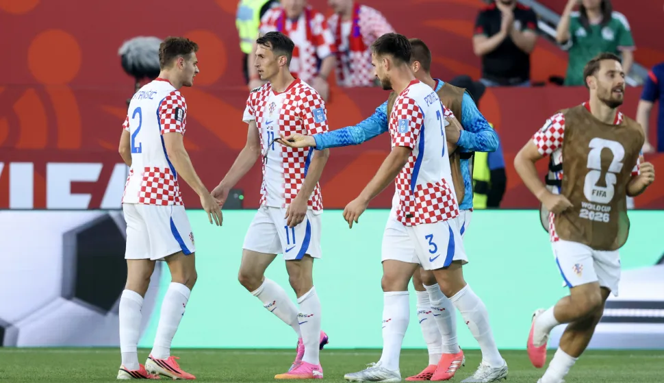 Toronto, 24.06.2026 - Utakmica drugog kola skupine L Svjetskog nogometnog prvenstva, Panama - Hrvatska na BMO Field stadionu u Torontu. Na slici Josip Stani&scaron;ić, Ante Budimir, Marin Pongračić slave zgoditak koji je postigao Ante Budimir.foto HINA/ Daniel KASAP/ ds