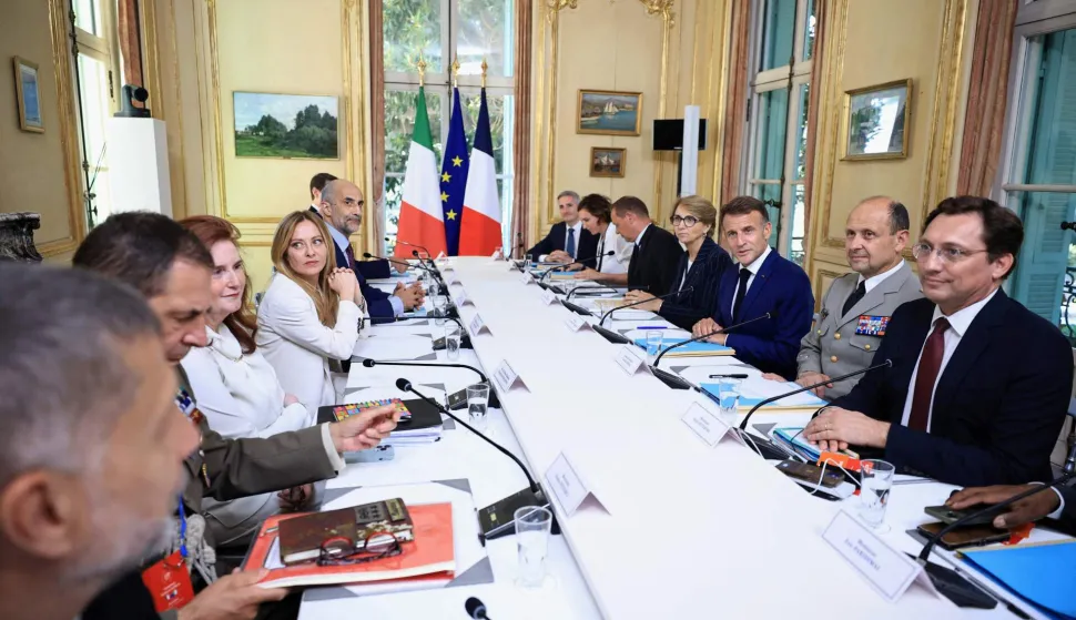 France's President Emmanuel Macron, Italy's Prime Minister Giorgia Meloni and members of their government attend a Franco-Italian summit in Antibes, French Riviera, on June 25, 2026. The talks mark the first Franco-Italian summit since a treaty on a strategic alliance came into force in 2021, elevating relations to a level comparable to that between France and Germany. (Photo by Manon Cruz/POOL/AFP)