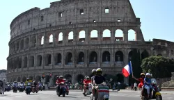 Vespa enthusiasts from around the world ride during the parade of the Vespa World Days marking the 80th anniversary of the iconic Italian brand of scooters in Rome on June 27, 2026. (Photo by Alberto PIZZOLI/AFP)