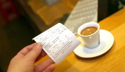 03.01.2013., Frankopanska, Zagreb - Neven Brajkovic, vlasnik caffe bara A zasto ne, snizit ce cijenu kave nakon uvodjenja fiskalnih blagajni. Photo: Sanjin Strukic/PIXSELL------dva stupca novosti