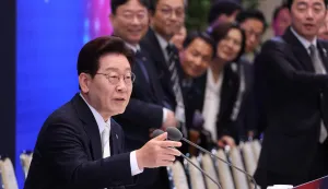 South Korean President Lee Jae Myung attends a press conference to mark the first anniversary of his inauguration at the Blue House in Seoul on June 8, 2026. (Photo by Chung Sung-Jun/POOL/AFP)