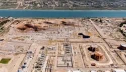This aerial photograph shows the Nahr Bin Umar Oil and Gas Field on the outskirts of the southern Iraqi city of Basra on April 29, 2026. Earlier this month, Baghdad said it had reached "understandings" with the United States and Iran to reduce the impact of the Hormuz blockade on Iraqi oil exports. (Photo by Hussein FALEH/AFP)