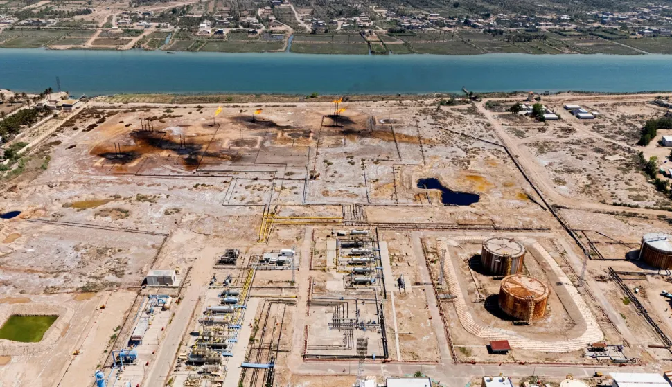 This aerial photograph shows the Nahr Bin Umar Oil and Gas Field on the outskirts of the southern Iraqi city of Basra on April 29, 2026. Earlier this month, Baghdad said it had reached "understandings" with the United States and Iran to reduce the impact of the Hormuz blockade on Iraqi oil exports. (Photo by Hussein FALEH/AFP)