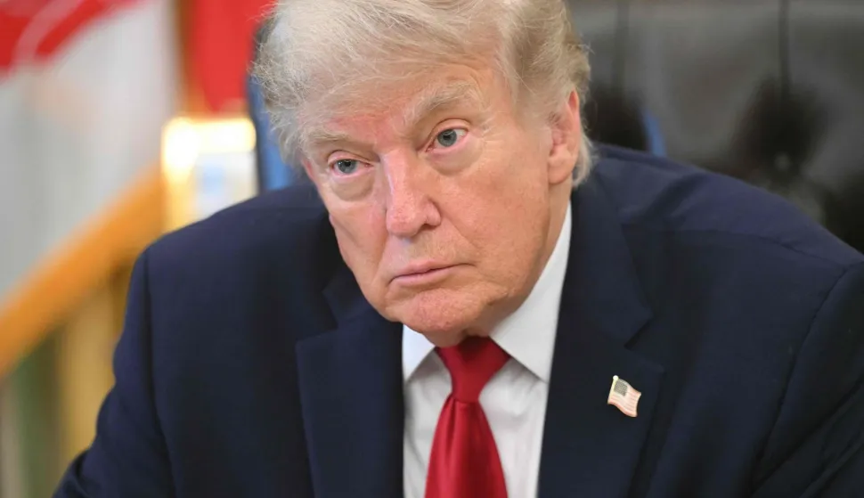 US President Donald Trump speaks after signing a presidential memo on pollution control in vehicles at the Oval Office of the White House in Washington, DC, on June 29, 2026. (Photo by SAUL LOEB/AFP)