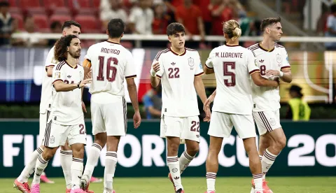 Spain's players celebrate after winning the 2026 World Cup Group H football match between Uruguay and Spain at the Guadalajara Stadium in Zapopan on June 26, 2026. (Photo by Ulises RUIZ/AFP)