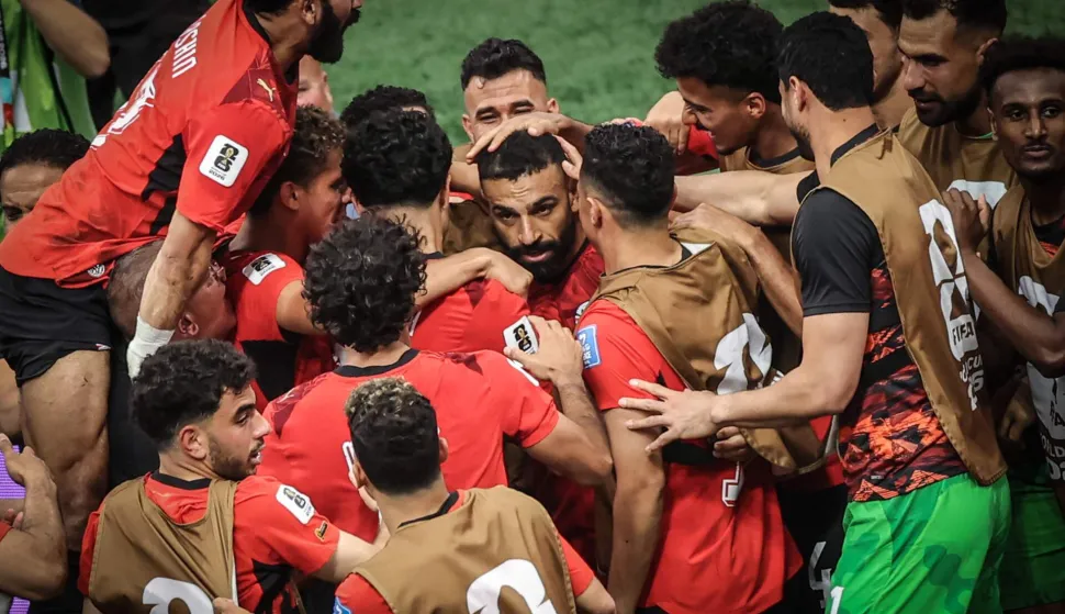 VANCOUVER, BRITISH COLUMBIA - JUNE 21: (EDITOR?S NOTE: This image has been digitally enhanced) Mohamed Salah #10 of Egypt celebrates the team's second goal with teammates the FIFA World Cup 2026 Group G match between New Zealand and Egypt at BC Place Vancouver on June 21, 2026 in Vancouver, British Columbia. Alex Grimm/Getty Images/AFP (Photo by ALEX GRIMM/GETTY IMAGES NORTH AMERICA/Getty Images via AFP)