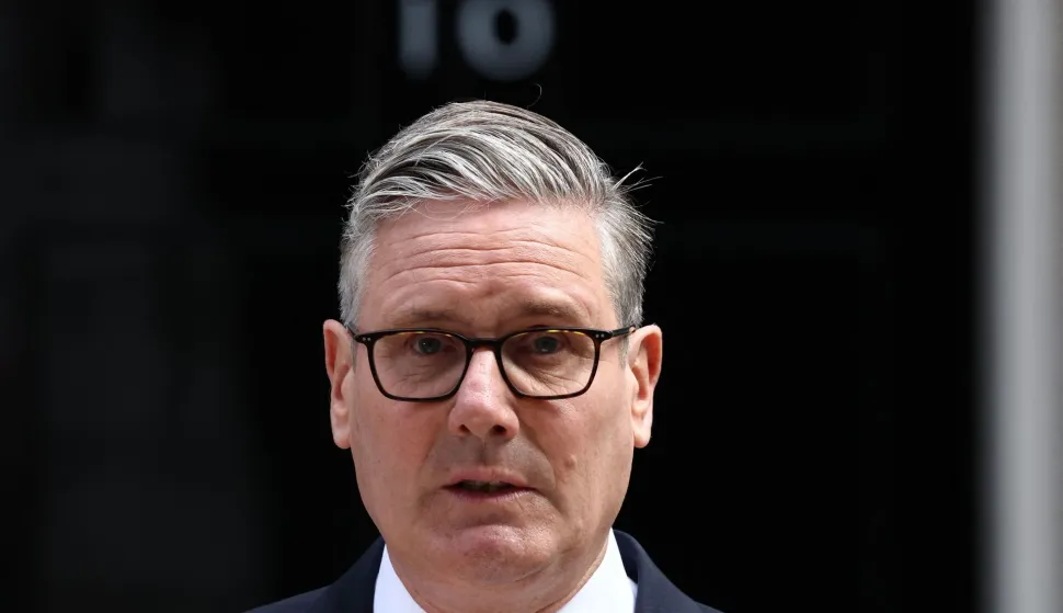 TOPSHOT - Britain's Prime Minister Keir Starmer makes a statement on his future outside 10 Downing Street on the morning of June 22, 2026, in London. Embattled British Prime Minister Keir Starmer will set out plans to step down, Monday, UK media has reported, the same day his likely successor is expected to be sworn in as a member of parliament. (Photo by HENRY NICHOLLS/AFP)