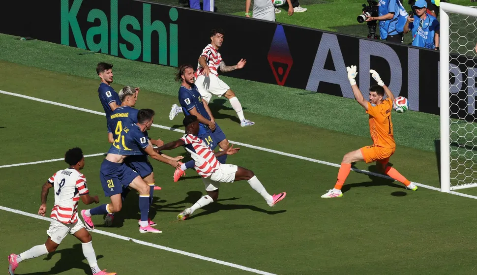 SANTA CLARA, CALIFORNIA - JULY 01: Christian Pulisic #10 of the United States passes the ball across the penalty box during the FIFA World Cup 2026 Round of 32 match between USA and Bosnia and Herzegovina at San Francisco Bay Area Stadium on July 01, 2026 in Santa Clara, California. Michael Steele/Getty Images/AFP (Photo by MICHAEL STEELE/GETTY IMAGES NORTH AMERICA/Getty Images via AFP)