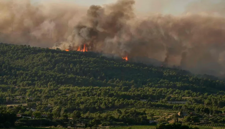 This photograph shows a wildfire in Pouzols-Minervois, southwestern of France, July 1, 2026. (Photo by Idriss Bigou-Gilles/AFP)