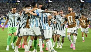 Argentina's defender #13 Cristian Romero celebrates with teammates scoring his team's third goal during the 2026 World Cup round of 32 football match between Argentina and Cape Verde at the Miami Stadium in Miami Gardens on July 3, 2026. (Photo by CHANDAN KHANNA/AFP)