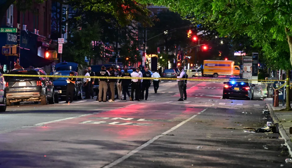 NYPD police officers work the scene where an NYPD officer was reported to be shot in the vest in the area of Nostrand Avenue and St. John's Place in Brooklyn, New York, United States on July 5, 2026. Sunday morning after approximately 4:00 am, the shooting occurred. Investigators with the NYPD Crime Scene Unit, detectives and the Force Investigation Division are staged in the area processing the scene. Sources say that a suspect was taken into custody. The investigation is ongoing. (Photo by Kyle Mazza/Sipa USA) Photo: Kyle Mazza/SIPA USA