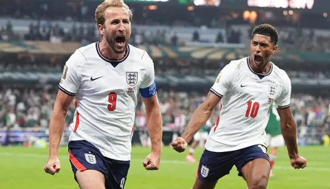 England's Harry Kane (L) celebrates after scoring the team's third goal from the penalty spot in the second half of a World Cup round of 16 football match against Mexico at Mexico City Stadium in the Mexican capital on July 5, 2026. (Kyodo) ==Kyodo Photo via Newscom
