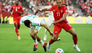 VANCOUVER, BRITISH COLUMBIA - JULY 02: Dan Ndoye #11 of Switzerland competes for the ball against Rayan Ait-Nouri #15 of Algeria during the FIFA World Cup 2026 Round of 32 match between Switzerland and Algeria at BC Place Vancouver on July 02, 2026 in Vancouver, British Columbia. Emilee Chinn/Getty Images/AFP (Photo by Emilee Chinn/GETTY IMAGES NORTH AMERICA/Getty Images via AFP)