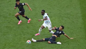 SEATTLE, WASHINGTON - JULY 06: Dodi Lukebakio #14 of Belgium is tackled by Malik Tillman #17 of the United States during the FIFA World Cup 2026 Round of 16 match between USA and Belgium at Seattle Stadium on July 06, 2026 in Seattle, Washington. David Ramos/Getty Images/AFP (Photo by David Ramos/GETTY IMAGES NORTH AMERICA/Getty Images via AFP)