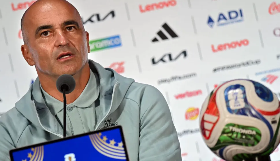 Portugal's Spanish head coach Roberto Martinez answers to journalists during a press conference at the Dallas Stadium in Arlington, Texas on July 5, 2026, on the eve of the 2026 World Cup round of 16 football match between Portugal and Spain. (Photo by Paul ELLIS/AFP)
