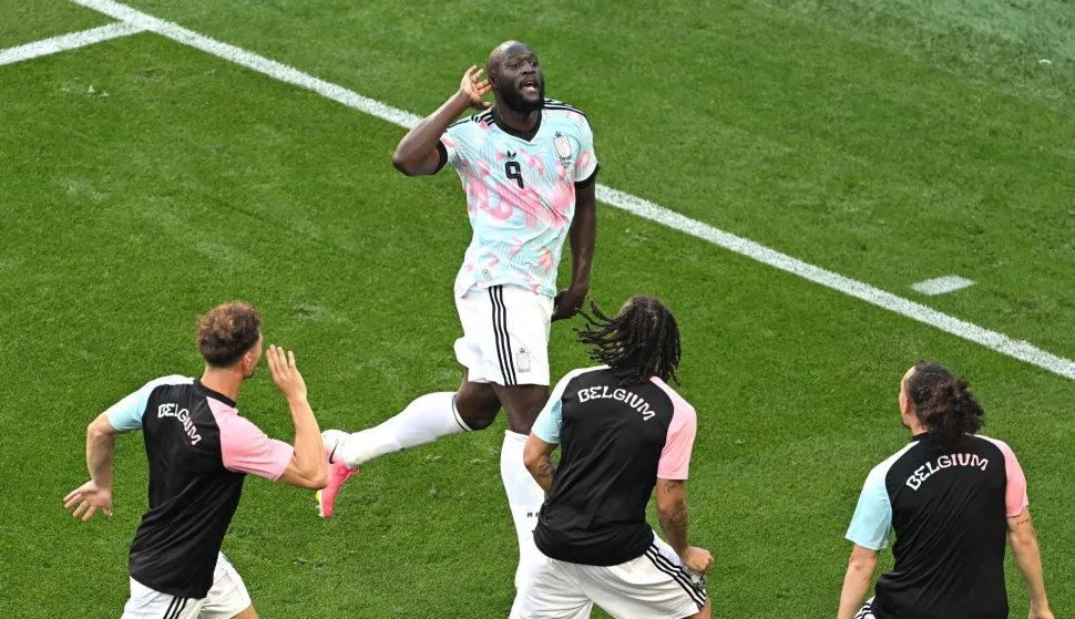 SEATTLE, WASHINGTON - JULY 06: Romelu Lukaku #9 of Belgium celebrates with teammates after scoring the team's fourth goal during the FIFA World Cup 2026 Round of 16 match between USA and Belgium at Seattle Stadium on July 06, 2026 in Seattle, Washington. David Ramos/Getty Images/AFP (Photo by David Ramos/GETTY IMAGES NORTH AMERICA/Getty Images via AFP)