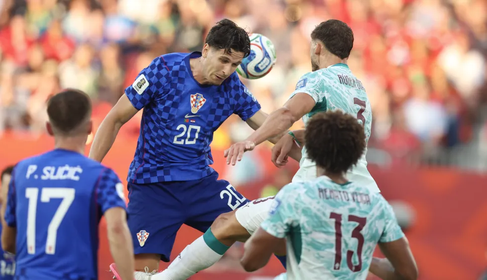 Torongo, 03.07.2026 - Utakmica 1/16 finala Svjetskog nogometnog prvenstva Portugal - Hrvatska u Torontu. Na slici Igor Matanović, Ruben Dias.foto HINA/ Daniel KASAP/ ds