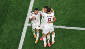 ARLINGTON, TEXAS - JULY 06: Mikel Merino #6 of Spain celebrates with teammates Pedro Porro #12 and Fabian Ruiz #8 after scoring his team's first goal during the FIFA World Cup 2026 Round of 16 match between Portugal and Spain at Dallas Stadium on July 06, 2026 in Arlington, Texas. Kevin C. Cox/Getty Images/AFP (Photo by Kevin C. Cox/GETTY IMAGES NORTH AMERICA/Getty Images via AFP)