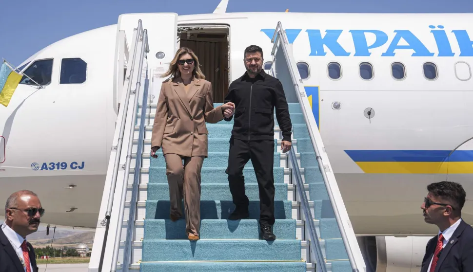 Ukraine's President Volodymyr Zelensky arrives with his wife Olena Zelenska (R) at Esenboga Airport to attend the 36th NATO Heads of State and Government Summit in Ankara on July 7, 2026. (Photo by Metin Akta?/POOL/AFP)