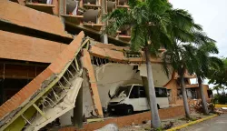 View of the destroyed Marriot Hotel in Playa Grande, Catia La Mar, La Guaira state, Venezuela on July 9, 2026, following the June 24 twin earthquakes. The United Nations launched an urgent appeal on July 8, 2026 for nearly 0 million towards Venezuela earthquake relief operations as the death toll from the disaster rose to more than 3,800 people. (Photo by MARTIN BERNETTI/AFP)