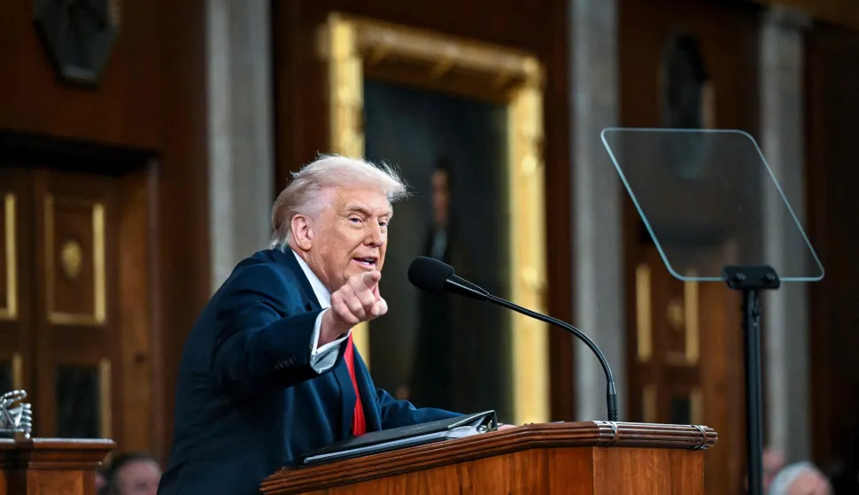 US President Donald Trump delivers the first State of the Union address of his second term to a joint session of Congress in the House Chamber of the United States Capitol in Washington, DC, on February 24, 2026. (Photo by Kenny HOLSTON/POOL/AFP)