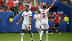 England's midfielder #10 Jude Bellingham celebrates scoring his team's first goal during the 2026 World Cup football tournament quarter-final match between Norway and England at Miami Stadium in Miami Gardens on July 11, 2026. (Photo by MAURO PIMENTEL/AFP)