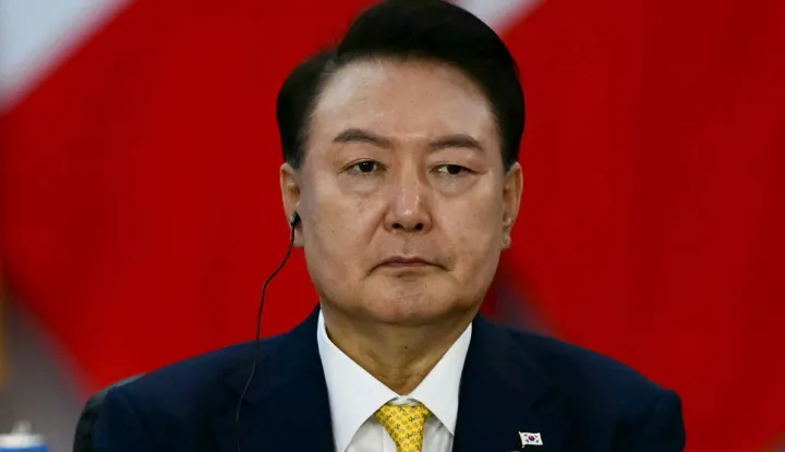 (FILES) South Korea's President Yoon Suk Yeol attends the first day of the G20 Summit in Rio de Janeiro, Brazil, on November 18, 2024. South Korea's highest court on July 9, 2026 upheld ex-president Yoon Suk Yeol's seven year prison sentence over crimes tied to his botched 2024 martial law declaration and its chaotic aftermath. (Photo by Pablo PORCIUNCULA/AFP)