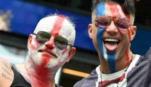 England fans cheer for their team before the start of the 2026 World Cup football tournament quarter-final match between Norway and England at Miami Stadium in Miami on July 11, 2026. (Photo by ROBERTO SCHMIDT/AFP)