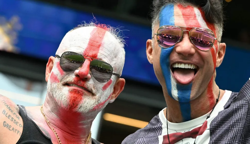 England fans cheer for their team before the start of the 2026 World Cup football tournament quarter-final match between Norway and England at Miami Stadium in Miami on July 11, 2026. (Photo by ROBERTO SCHMIDT/AFP)