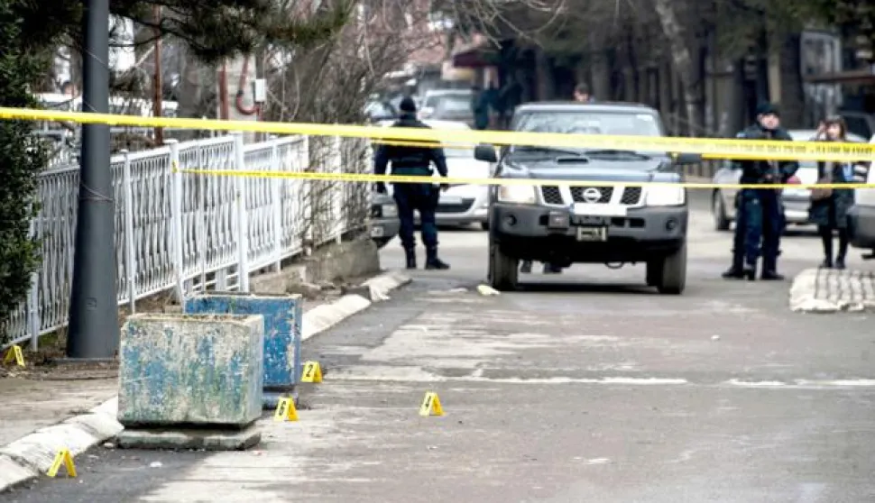 epa06443278 Police guards at the sealed-off crime scene where Oliver Ivanovic, the former State Secretary for Kosovo and Metohija and a subject of a controversial war crimes trial and retrial, was shot in Mitrovica, Serbia, 16 January 2018. The prominent Ivanovic was shot in front of his office in Mitrovica, Kosovo, 16 January 2018, according to media reports. EPA/STRINGER