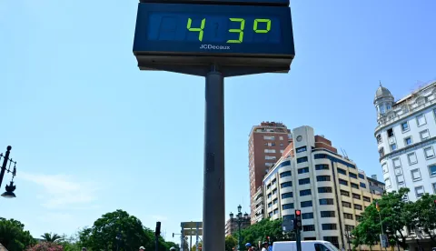 An urban thermometer reading 43 degrees Celsius is seen during a hewatwave in Valencia on July 7, 2026. Spain's AEMET weather agency on Tuesday declared a top level red heat alert in three eastern regions and predicted that temperatures would rise above 40C. The Aragon, Catalonia and Valencia regions are predicted to be among the worst hit in a new heatwave that is hitting southern Europe this week. Forecasters have said it will last until at least Thursday. (Photo by Jose Jordan/AFP)