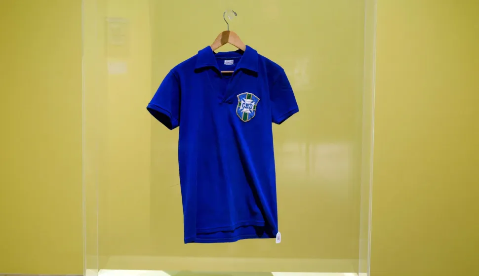 The jersey worn by Brazilian football legend Pele during the 1958 FIFA World Cup final match against Sweden is exhibited during a press preview at the Sotheby's Breuer building in New York, on July 1, 2026. The shirt will be put to auction as part of the "Summer Season at the Breuer" from late June through mid-August 2026. (Photo by TIMOTHY A. CLARY/AFP)
