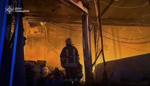 This handout photograph taken and released by the Ukrainian State Emergency Service on July 19, 2026 shows a rescuer putting out a fire in a logistics facility and warehouses following missile strikes on the Bucha district, near Ukrainian capital of Kyiv, amid the Russian invasion of Ukraine. Russian missiles rocked Ukraine's capital overnight, damaging residential buildings and wounding at least two people a day after Kyiv launched a wave of drone strikes deep into Russian territory. (Photo by Handout/Ukrainian State Emergency Service/AFP)