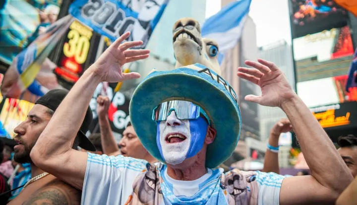 Argentina fans gather and celebrate in Times Square in New York, on July 18, 2026, ahead of the 2026 World Cup Final between Spain and Argentina. (Photo by Ryan MURPHY/AFP)